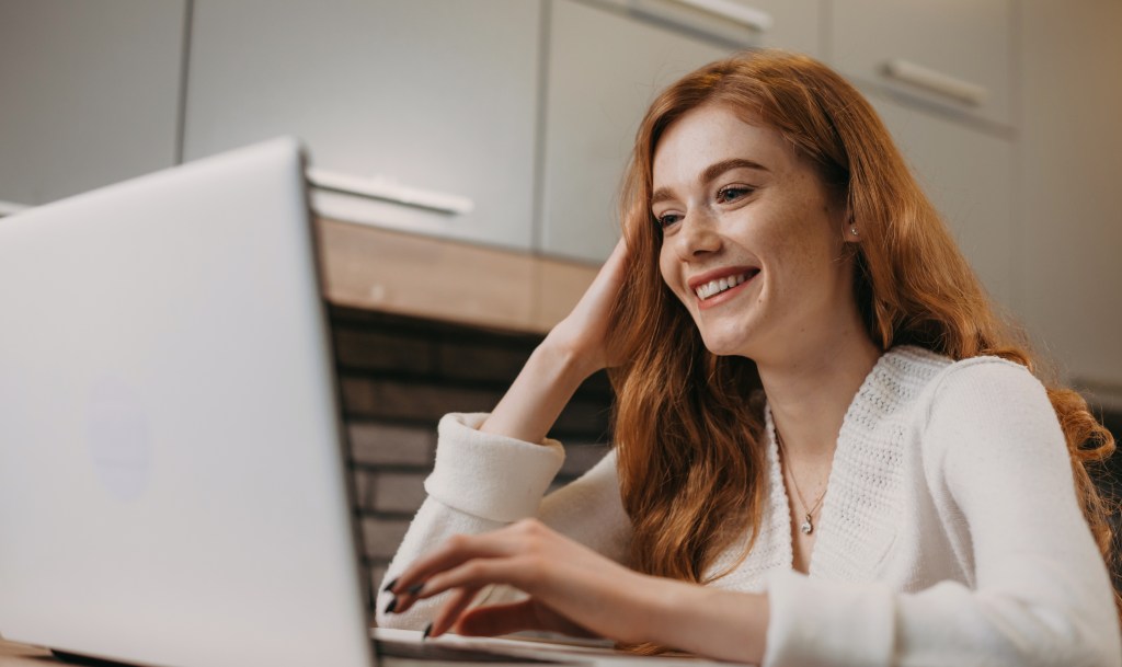 Person applying for an instant online loan on a computer. 
